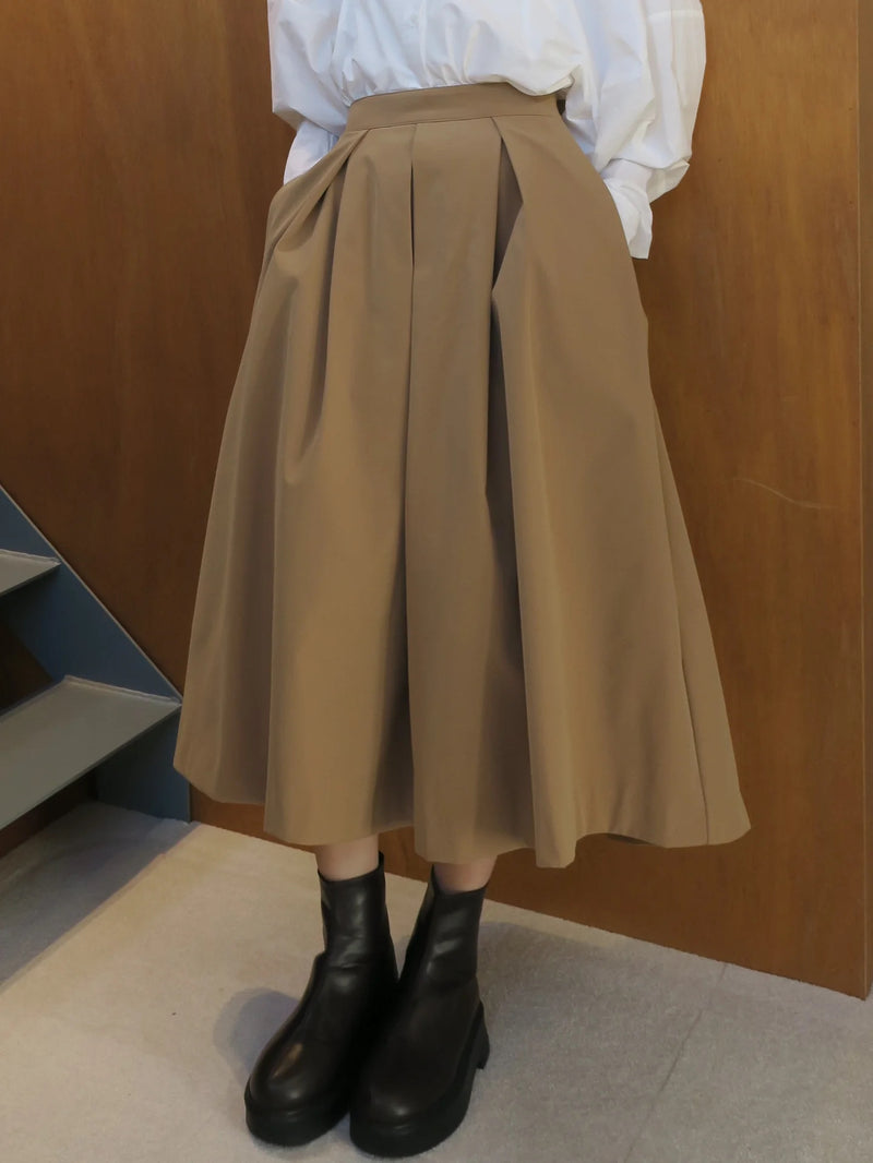 TUCK VOLUME FLARE SKIRT